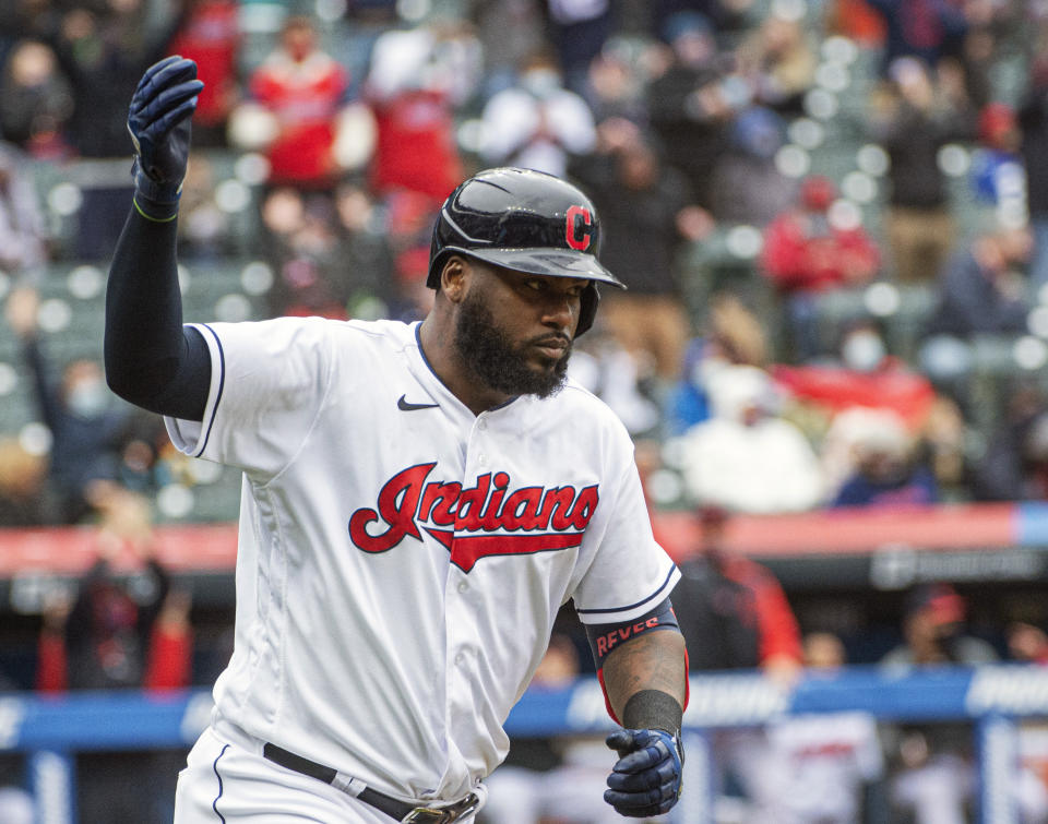 Cleveland Indians' Franmil Reyes reacts after hitting a three-run home run off New York Yankees starting pitcher Jameson Taillon during the fourth inning of a baseball game in Cleveland, Sunday, April 25, 2021. (AP Photo/Phil Long)