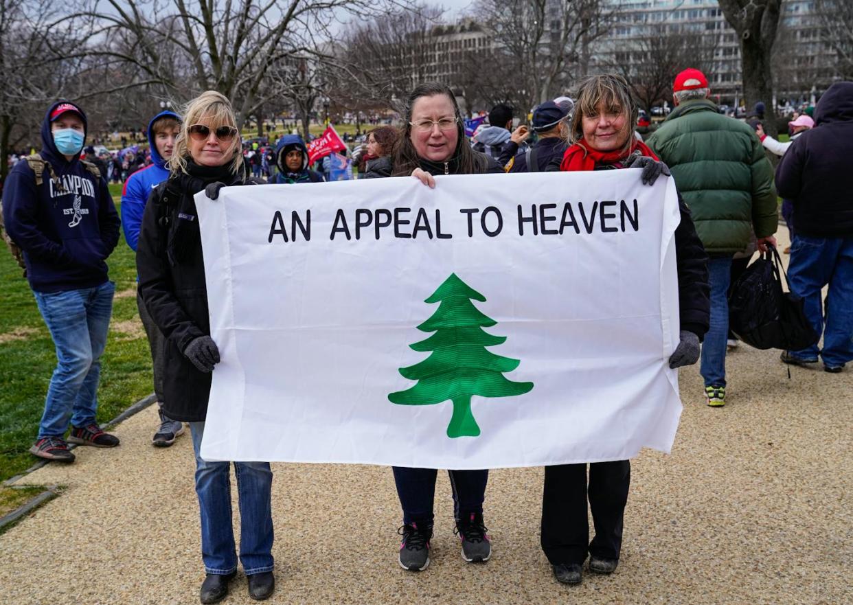 Demonstrators display a call for Christian nationalism at the Jan. 6, 2021, 'Stop the Steal' rally that preceded the storming of the Capitol. <a href="https://www.gettyimages.com/detail/news-photo/religious-groups-and-crowds-gather-for-the-stop-the-steal-news-photo/1294967494" rel="nofollow noopener" target="_blank" data-ylk="slk:Robert Nickelsberg/Getty Images;elm:context_link;itc:0;sec:content-canvas" class="link ">Robert Nickelsberg/Getty Images</a>