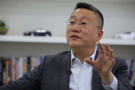 Freeman Shen, founder and CEO of WM Motor Technology Co., Ltd. speaks during an interview with Reuters at his office in shanghai, China, August 1, 2016. REUTERS/Aly Song