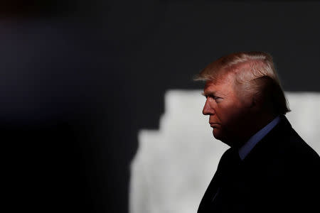 U.S. President Donald Trump prepares to address the annual March for Life rally, taking place on the National Mall, from the White House Rose Garden in Washington, U.S., January 19, 2018. REUTERS/Carlos Barria