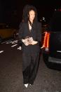 <p>In a black blazer, Louis Vuitton bag, black tearaway sweatpants and white pointed-toe pumps while out in NYC.</p>