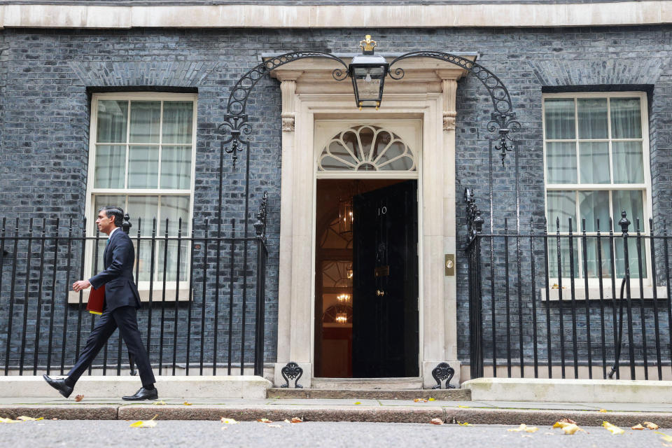 Britain's Prime Minister Rishi Sunak walks outside Number 10 Downing Street, in London, Britain, October 26, 2022. REUTERS/Hannah Mckay