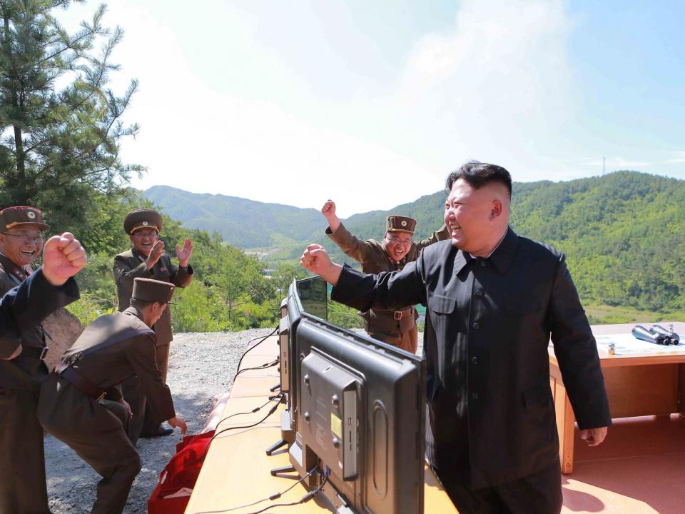 North Korean Leader Kim Jong-un reacts during the test-fire of intercontinental ballistic missile Hwasong-14 (Reuters)