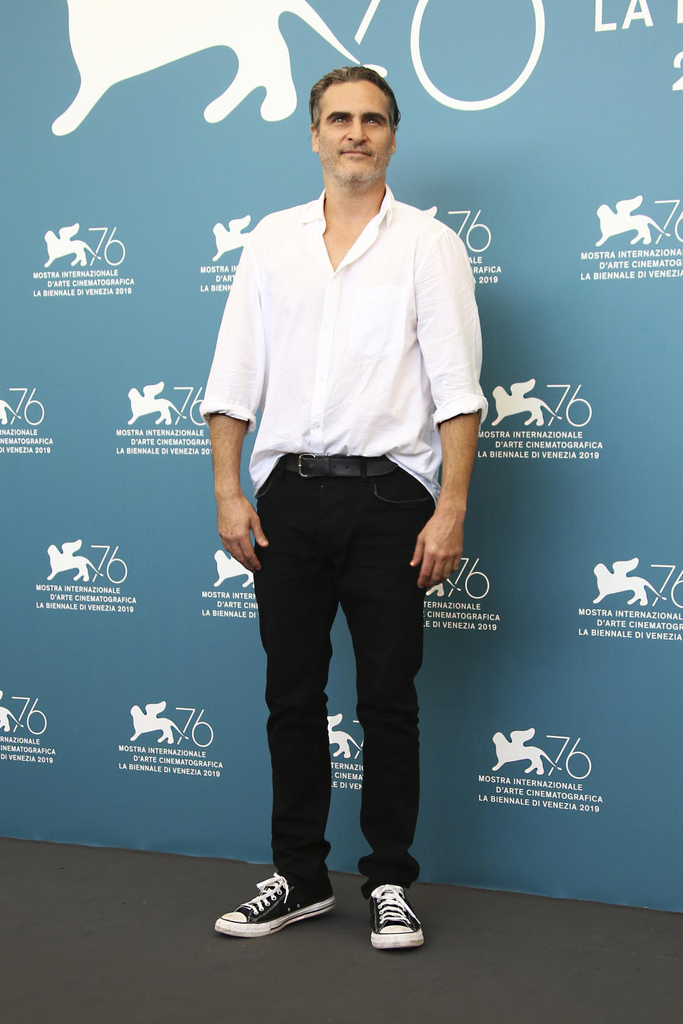 Actor Joaquin Phoenix poses for photographers at the photo call for the film 'Joker' at the 76th edition of the Venice Film Festival in Venice, Italy, Saturday, Aug. 31, 2019. (Photo by Joel C Ryan/Invision/AP)