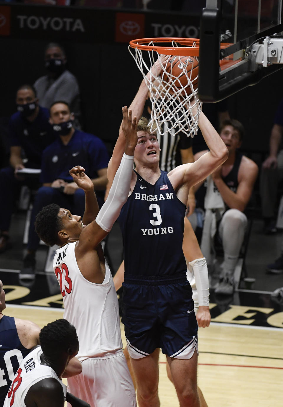 BYU forward Matt Haarms (3) shoots over San Diego State forward Joshua Tomaic (23) during the second half of an NCAA college basketball game Friday, Dec. 18, 2020, in San Diego. (AP Photo/Denis Poroy)