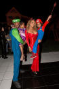 <p>Talk about friendly exes! Carey and ex-husband Nick Cannon — dressed as Luigi from Super Mario Brothers — spent the night with their cute kids, Monroe and Moroccan. (Photo: FilmMagic/FilmMagic) </p>