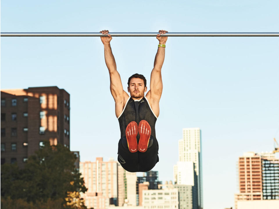 <p>Getty</p>How to Do It<ol><li>Grab a pullup bar and hang your body off the ground, to start. </li><li>Flex your abs and lats, then, without rocking or swinging, raise your straight legs as high as you can.</li><li>Lower with control to a dead hang. </li><li>That's 1 rep. Perform 4 x 20 reps.</li></ol>Pro Tip<p>If you lack hip or hamstring mobility, you can bend your knees to lessen the difficulty. </p>
