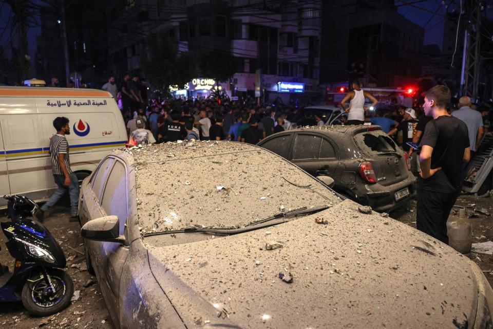 PHOTO: Debris cover damaged vehicles following an Israeli military strike on Beirut's southern suburbs, on July 30, 2024.  (Anwar Amro/AFP via Getty Images)