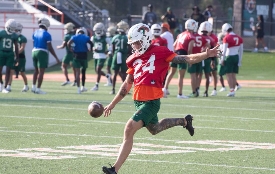 Punter Trey Wilhoit kicks the ball during FAMU team practice on Friday, August 9 2024.