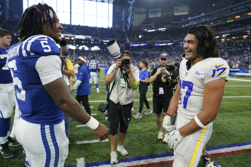 Los Angeles Rams wide receiver Puka Nacua, right, greets Indianapolis Colts quarterback Anthony Richardson, left, after the Rams defeated the Colts 29-23 in an NFL football game, Sunday, Oct. 1, 2023, in Indianapolis. | Michael Conroy, Associated Press