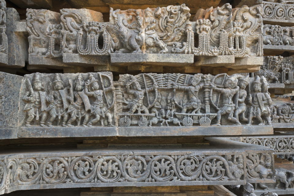 Depiction of Arjuna-Bhishma war from Mahabharata, at the base of temple, Hoysaleshwara temple, Halebidu, Karnataka, india.