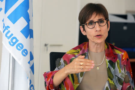 FILE PHOTO: FILE PHOTO: Mireille Girard, UNHCR representative in Lebanon gestures as she talks during an interview with Reuters in Beirut, Lebanon June 12, 2018. REUTERS/Aziz Taher