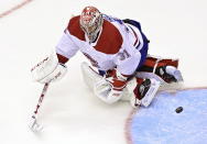 Montreal Canadiens' goaltender Carey Price (31) makes a save against the Philadelphia Flyers during the second period of an NHL Eastern Conference Stanley Cup first-round playoff game in Toronto, Ontario on Wednesday, Aug. 12, 2020. (Frank Gunn/The Canadian Press via AP)