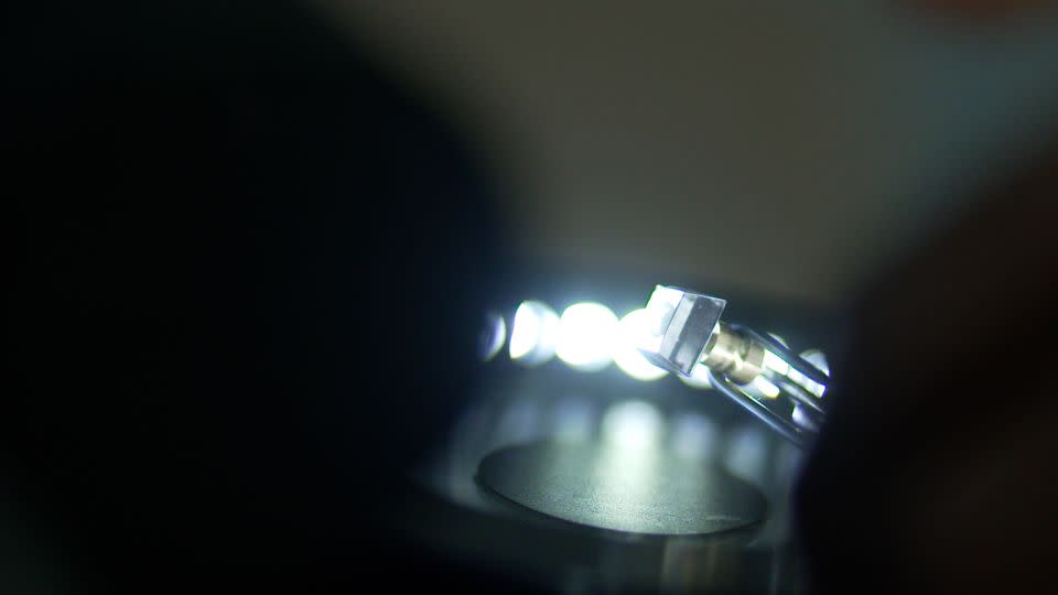 A rough diamond block ready to be polished, or sliced into seed diamonds. - Paul Devitt / CNN