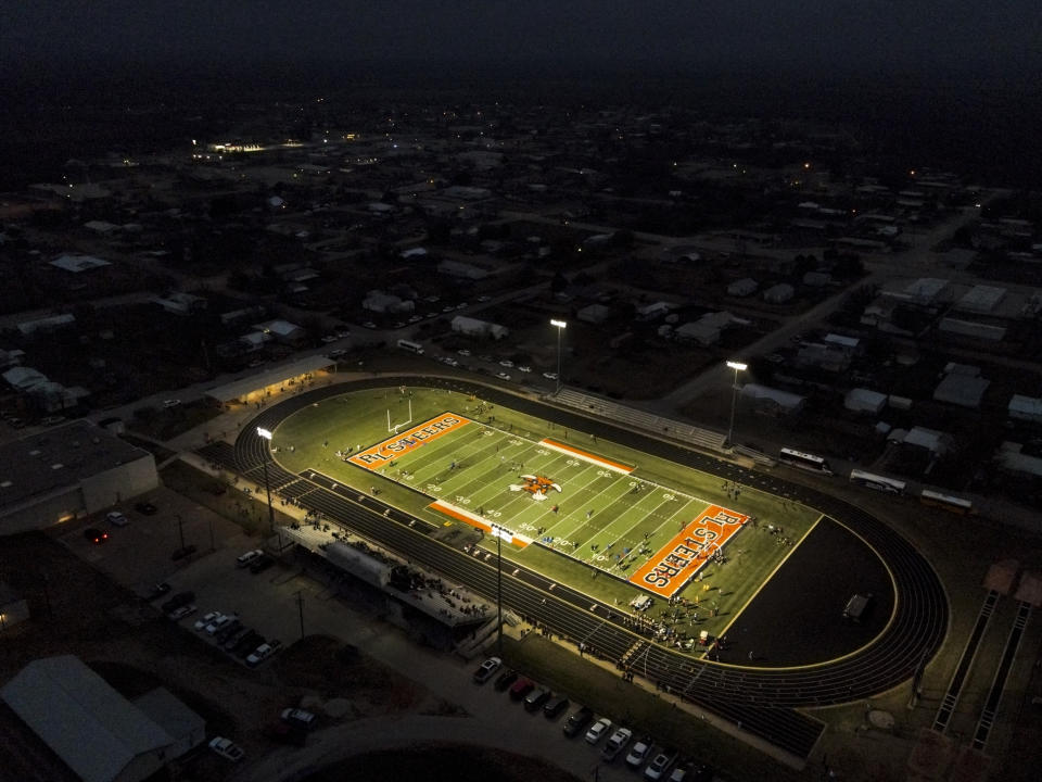 The lights of Robert Lee ISD’s track field can be seen right in the heart of Robert Lee, Texas on March 9, 2023. (Matthew Busch for NBC News)