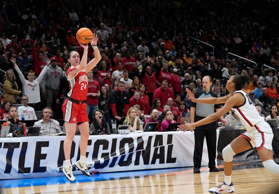 Ohio State guard Taylor Mikesell takes a shot over UConn forward Aubrey Griffin during the second half of an NCAA Tournament Sweet Sixteen game at Climate Pledge Arena in Seattle on Saturday, March 25, 2023. OSU won 73-61.