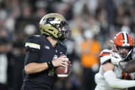 Purdue quarterback Hudson Card (1) looks for a receiver during the first half of the team's NCAA college football game against Syracuse in West Lafayette, Ind., Saturday, Sept. 16, 2023.(AP Photo/AJ Mast)