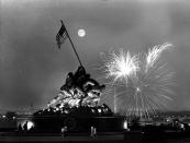 <p>This view, from the Virginia side of the Potomac River, shows the moon above the Iwo Jima Statue as fireworks burst over Washington, D.C., on July 4, 1966. The Washington Monument, obelisk, and the Lincoln Memorial can be seen in the background. (Photo: Charles Tasnadi/AP) </p>