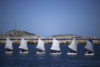 School children sail during a demonstration at the Roucas Blanc Marina constructed for the upcoming summer Olympic Games in Marseille, southern France, Tuesday, April 2, 2024. Marseille will host the Olympic sailing events during the Paris 2024 Olympic Games that run from July 26 to Aug.11, 2024. (AP Photo/Daniel Cole, File)
