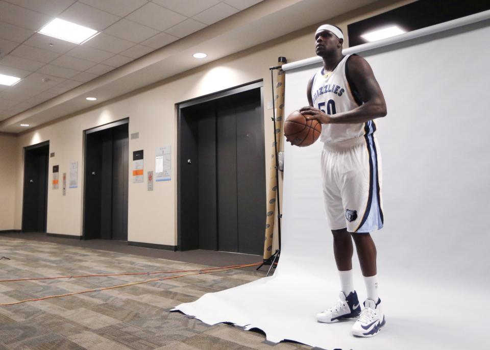 <p>“Hey, Zach Randolph, can you stand next to these elevators and pretend to be a statue? Thanks.” (AP) </p>