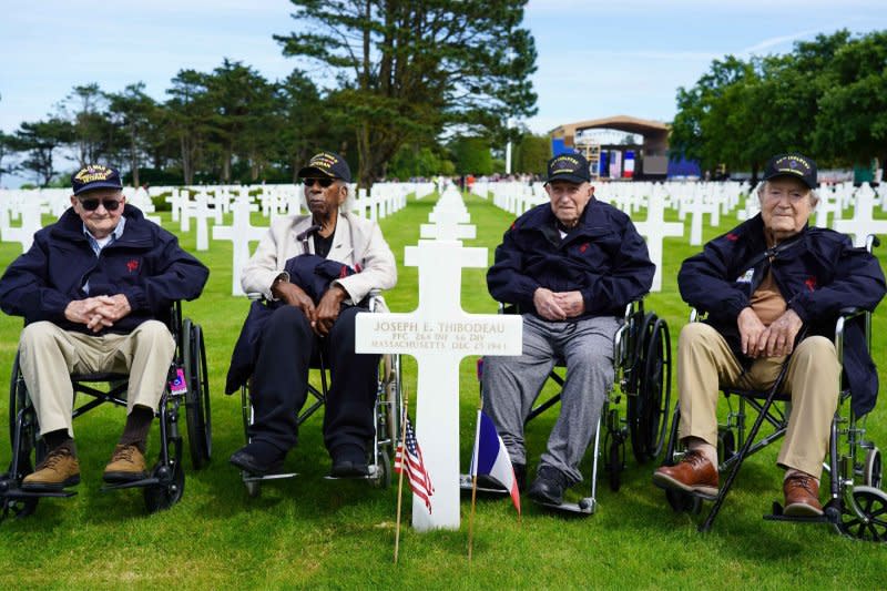 American World War II veterans sit amid the graves at the Normandy American Cemetery and Memorial after the US ceremony marking the 80th anniversary of the World War II "D-Day" Allied landings in Normandy, in Colleville-sur-Mer, which overlooks Omaha Beach in northwestern France, on Thursday, June 6, 2024. Photo by Ambassade US France/UPI