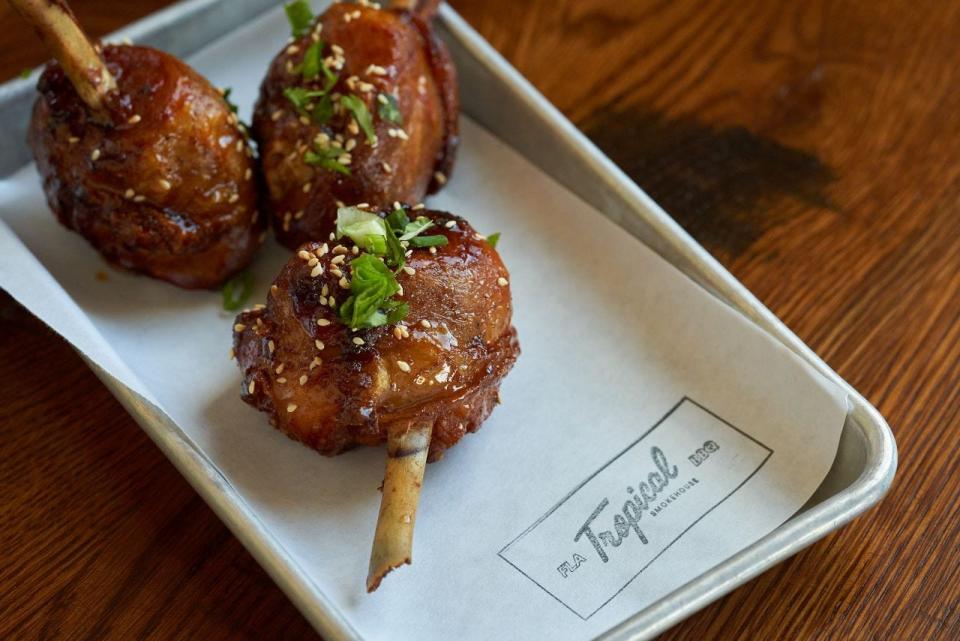 On the menu at Tropical Smokehouse restaurant in West Palm Beach: smoked chicken drumsticks.