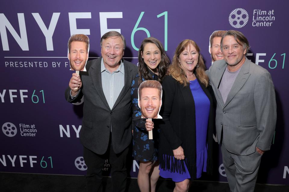 Richard Linklater, right, poses with Glen Powell's family at Lincoln Center's Alice Tully Hall in New York Tuesday.