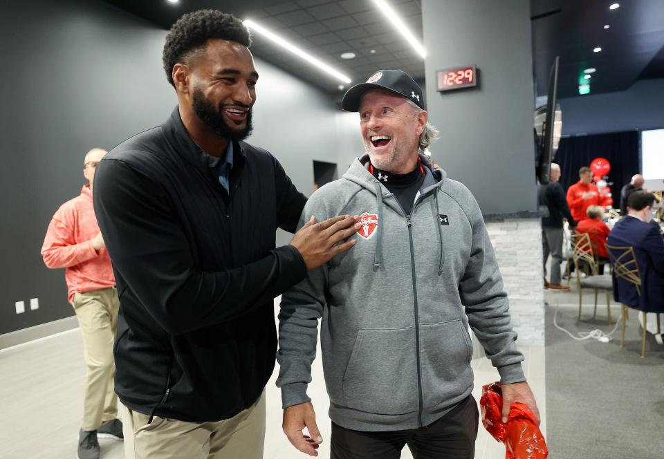 Former University of Utah football player Nate Orchard talks with University of Utah football coach Kyle Whittingham during the Crimson Collective launch event at the Rice-Eccles Stadium in Salt Lake City on Friday, April 21, 2023. The Crimson Collective is an independent NIL organization and the exclusive NIL collective for Utah football. | Kristin Murphy, Deseret News
