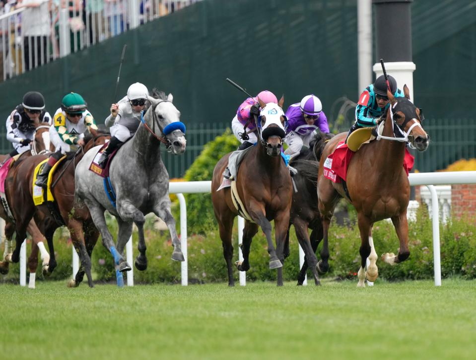 Nobals (1) takes the lead and goes on to win the Twin Spires Turf Spring at Churchill Downs, Saturday, May 6, 2023. 