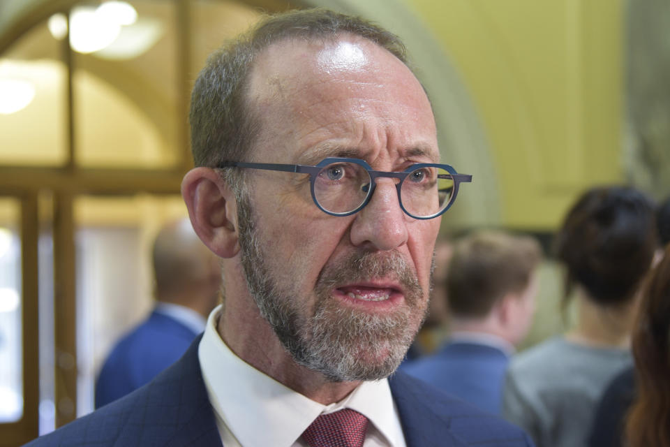 New Zealand's Health Minister Andrew Little speaks to the media at Parliament House in Wellington, New Zealand, on April 7, 2021. New Zealand announced Wednesday, April 21, 2021 it will overhaul its fragmented healthcare system to create a new national service similar to the one revered by many in Britain. Little said that over three years, the currently divided into 20 district health boards will be replaced by a single new body called Health New Zealand. (Ben McKay/AAP Image via AP)