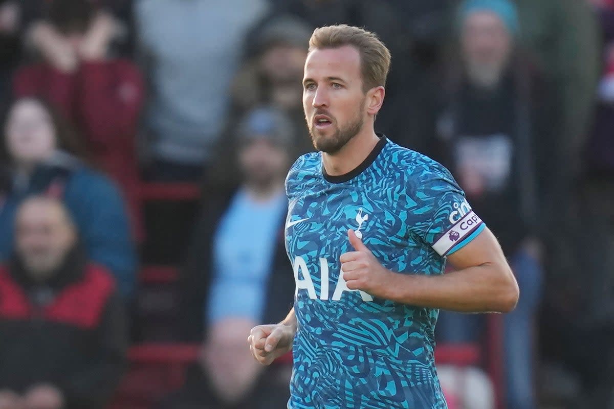 Tottenham’s Harry Kane celebrates after scoring his side’s first goal during the English Premier League soccer match between Brentford and Tottenham Hotspur at the Gtech Community Stadium in London, Monday, Dec. 26, 2022. (AP Photo/Kirsty Wigglesworth) (AP)