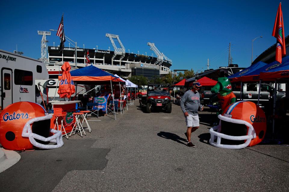 Gator fans set up shop early this week in the parking lot outside Jacksonville's TIAA Bank Field.