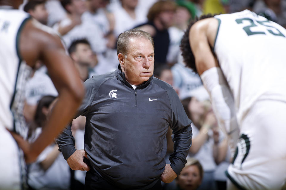 Michigan State coach Tom Izzo, center, Malik Hall, right, and Tyson Walker react during overtime against James Madison during an NCAA college basketball game, Monday, Nov. 6, 2023, in East Lansing, Mich. (AP Photo/Al Goldis)