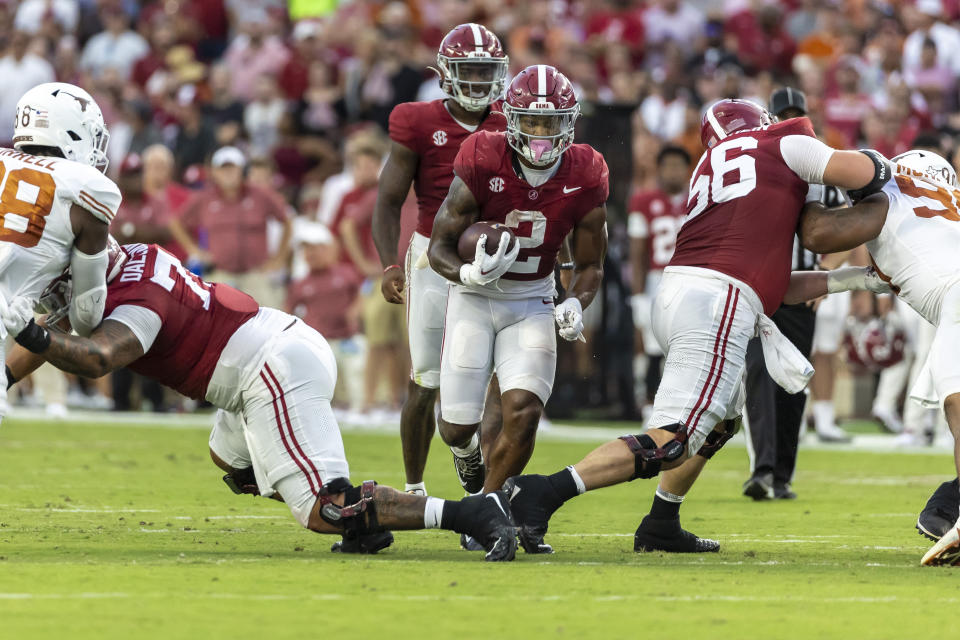 Alabama running back Jase McClellan (2) runs the ball against Texas during the first half of an NCAA college football game, Saturday, Sept. 9, 2023, in Tuscaloosa, Ala. (AP Photo/Vasha Hunt)