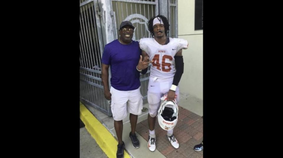 Arlington Bowie High School football star Anthony Strather is pictured with his grandfather, Lawrence Smith of Arlington. Strather was shot to death in 2019 while trying to stop a fight.