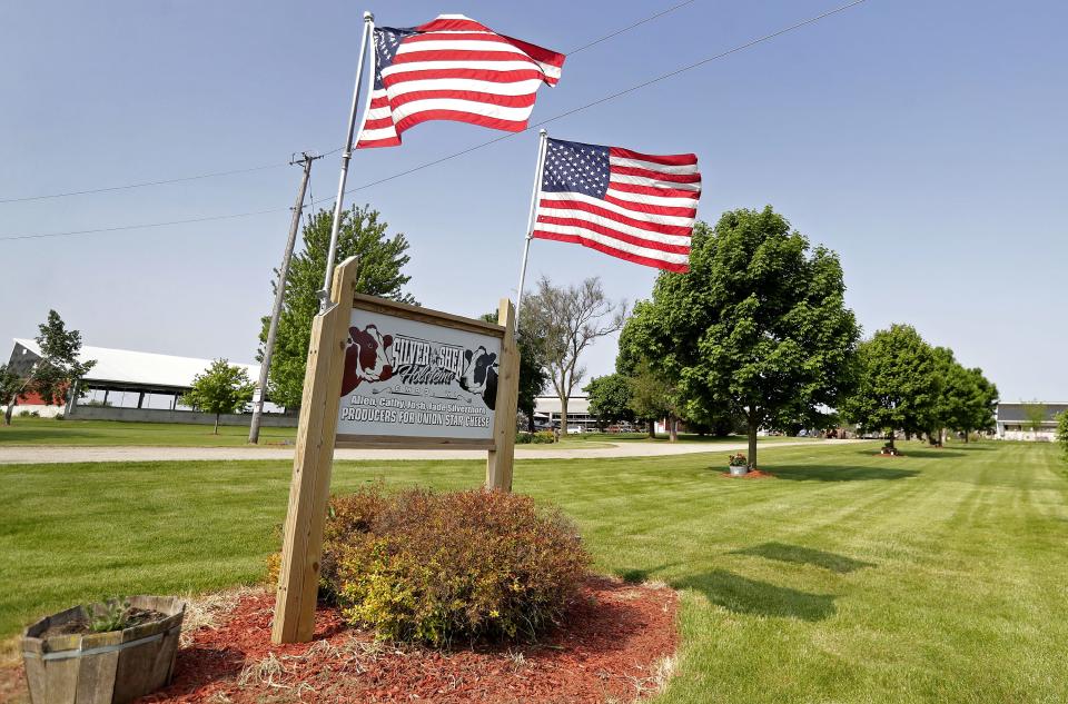 The sign for Silver-Shea Holsteins, owned by Allen and Cathy Silverthorn, proudly declares its connection to Union Star Cheese Factory on May 23 in Omro.