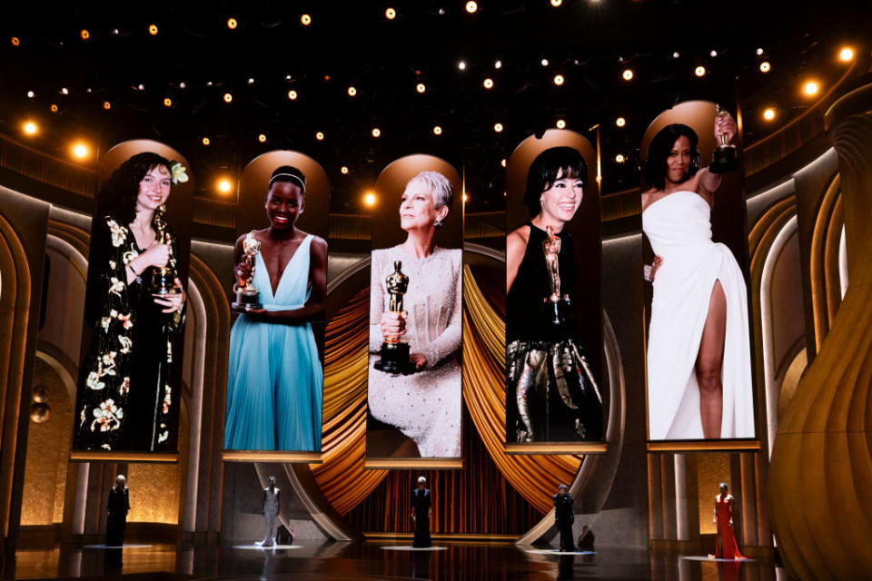 Mary Steenburgen, Lupita Nyong'o, Jamie Lee Curtis, Rita Moreno, and Regina King present the Oscar for Best Supporting Actress while standing under images of themselves winning the same award at previous ceremonies.<span class="copyright">Frank Micelotta—Disney via Getty Images</span>