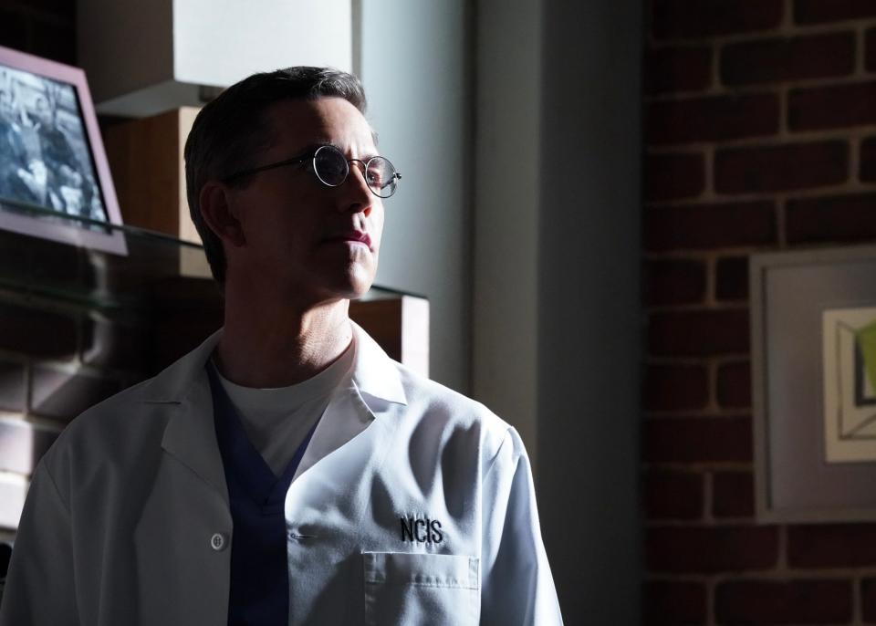 Brian Dietzen as Jimmy Palmer looks around Ducky's offices in the NCIS episode "The Stories We Leave Behind."