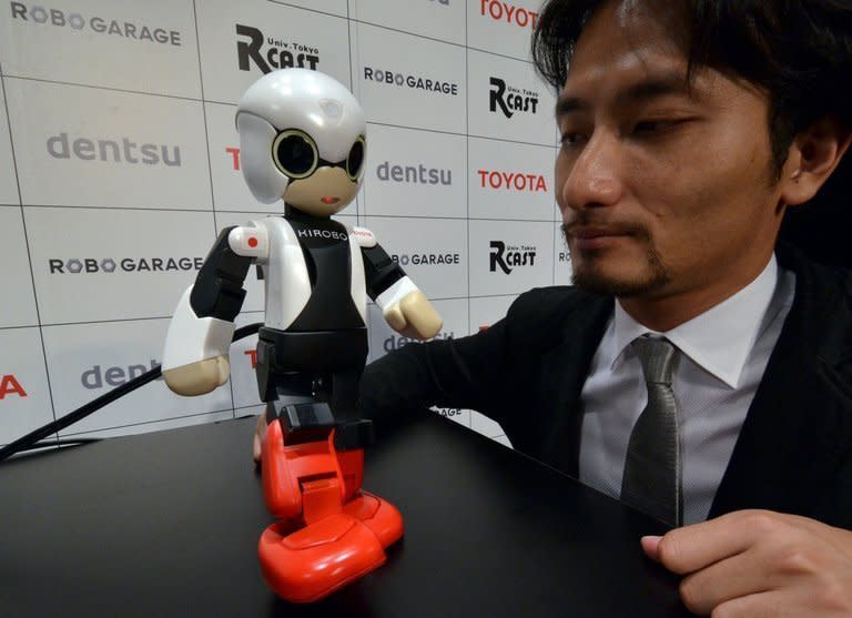 Japan's Tokyo University robot creator Tomotaka Takahashi demonstrates robot Kirobo in Tokyo on June 26, 2013. The small talking robot accompanied the cargo-carrying rocket launched from Japan Sunday to the International Space Station