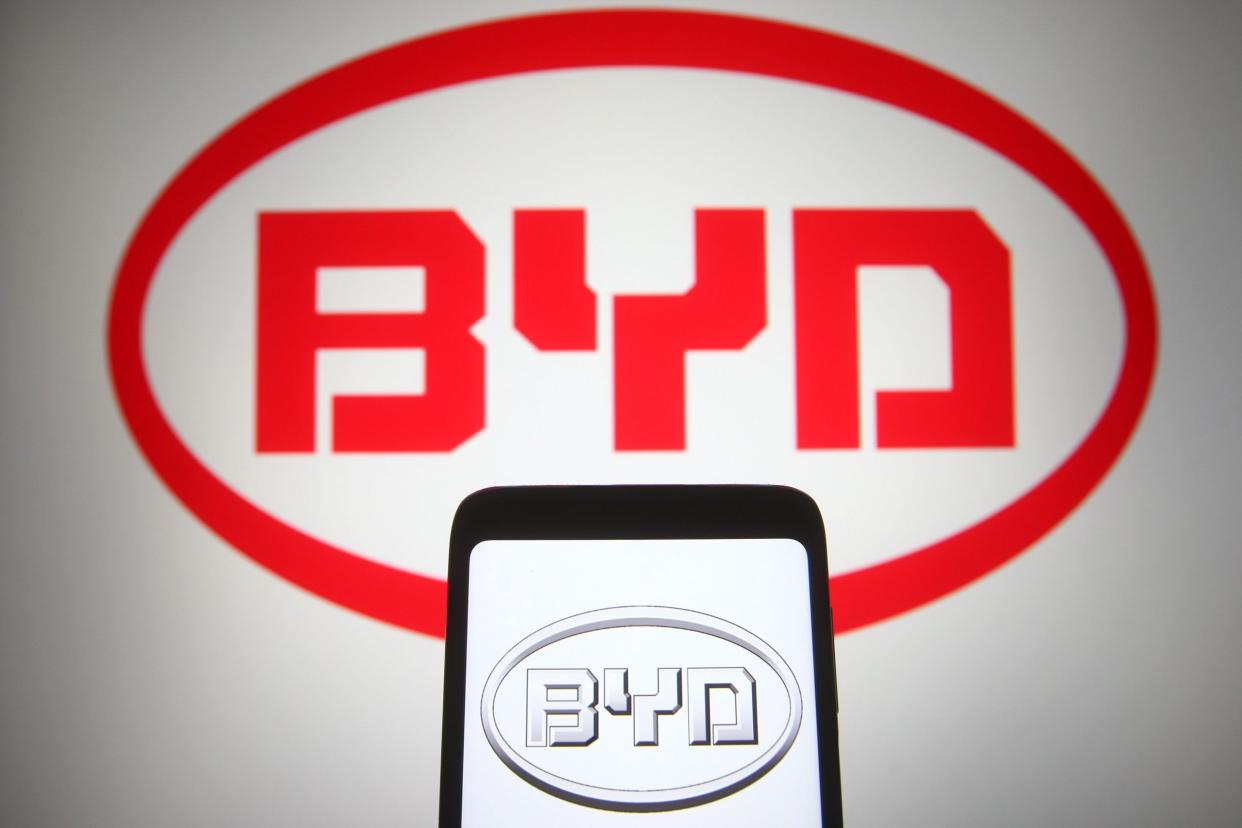 Mandatory Credit: Photo by Pavlo Gonchar/SOPA Images/Shutterstock (11790095n)In this photo illustration a BYD logo of an automotive Chinese multinational is seen on a smartphone and a pc screenIllustrative photo in Ukraine - 07 Mar 2021.