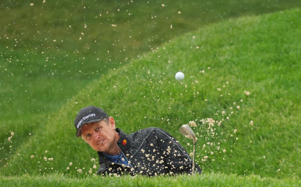 Justin Rose, at four shots back, is in contention - GETTY IMAGES