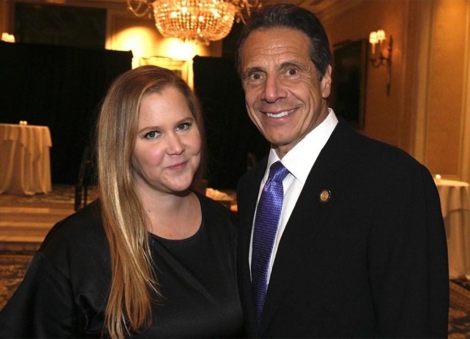 From left: Amy Schumer and New York Gov. Andrew Cuomo celebrate his birthday at Essex House in New York City.