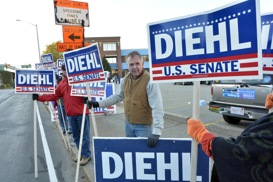 Supporters of Republican challenger state Rep. Geoff Diehl gather for the Massachusetts U.S. Senatorial debate against Democratic U.S. Sen. Elizabeth Warren, Sunday, Oct. 21, 2018, in Springfield, Mass. (Frederick Gore/The Republican via AP)