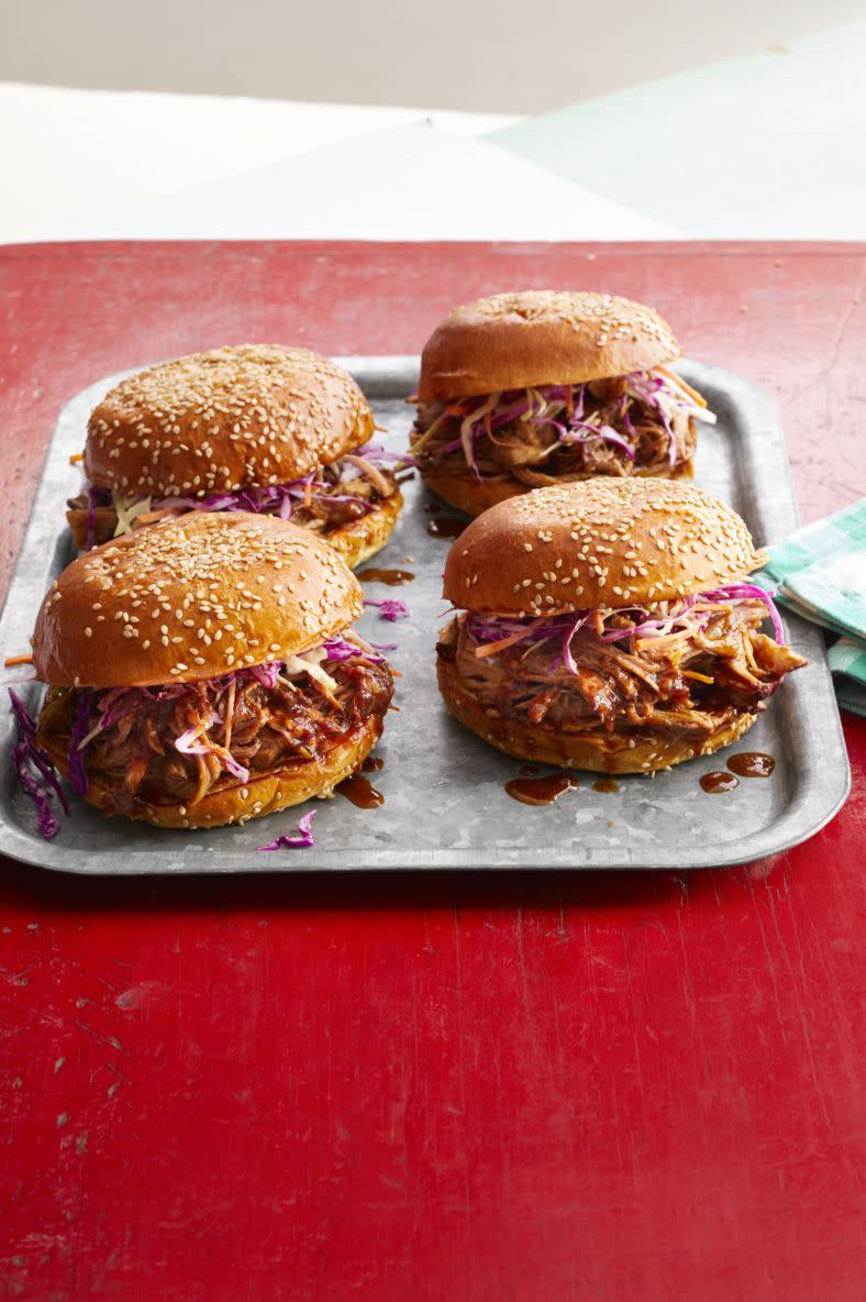 spicy dr pepper shredded pork on metal tray red background