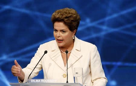 Presidential candidate and Brazilian President Dilma Rousseff of Workers' Party (PT) speaks during the first television debate at the Bandeirantes TV studio in Sao Paulo August 26, 2014. REUTERS/Paulo Whitaker