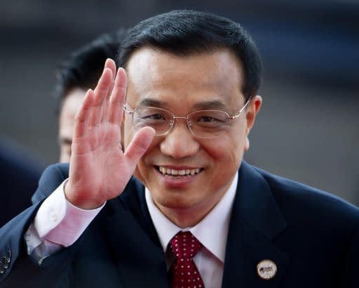 China's Vice Premier Li Keqiang arrives for a ceremony on the southern Chinese island of Hainan on April 2. Russian strongman Vladimir Putin and outgoing President Dmitry Medvedev were set to host Li, who is tipped to become premier amid transitions of power in both countries