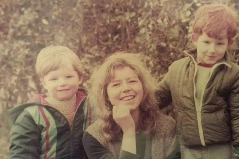 Tom pictured with his late mum, Patricia, and brother Jack