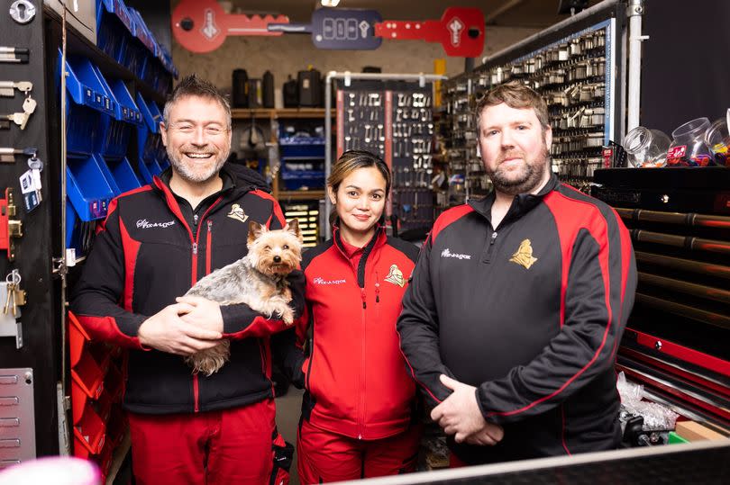 Sir-Fix-a-lock founder Paul Montgomery, with his pet Lottie Dog, and employees Leslie Dy-Durden and James Agnew -Credit:UpArt Photography