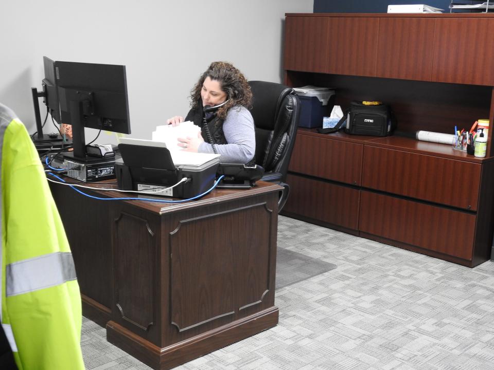 Administrative Assistant Janette Russell works in an office at the new Coshocton County Emergency Medical Services station. Administration is working out of the building now with other personnel and equipment to be in by the end of March.