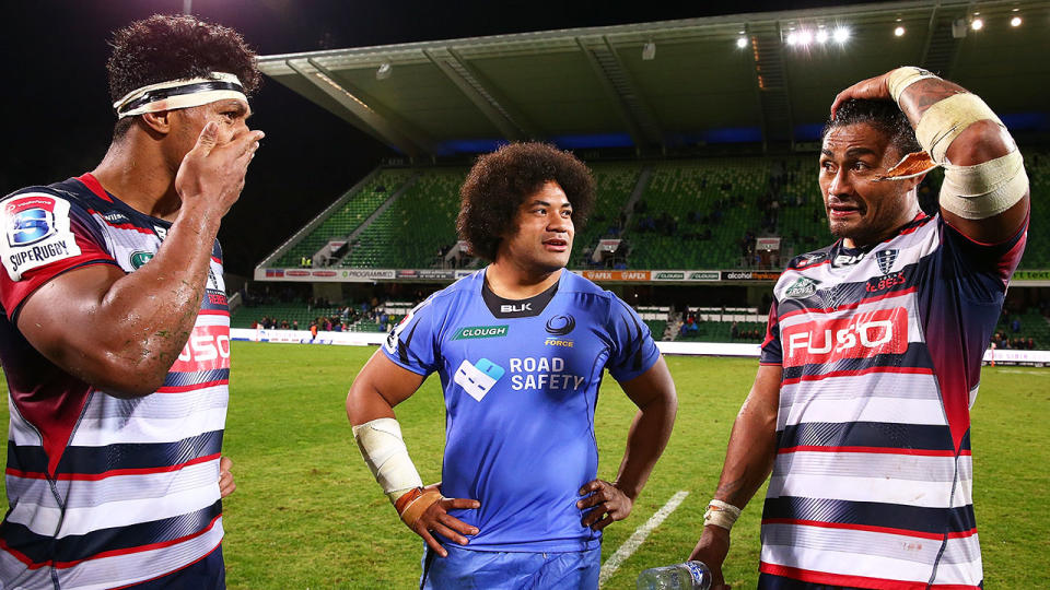 Pictured here, Lopeti Timani and Amanaki Mafi chat after a Super Rugby match for the Rebels.